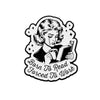 Black and white enamel lapel pin featuring a woman with curled hair reading a book