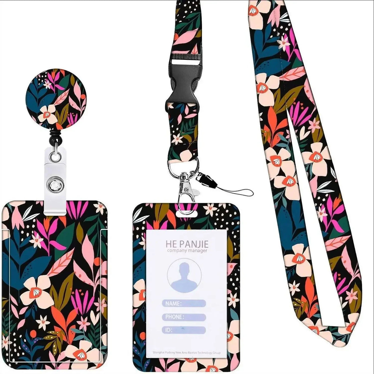 A floral patterned badge reel with a black and pink lanyard and an ID card holder.
