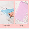 A pink transparent document pouch with a bunny design and a blue pouch, demonstrating waterproof features.