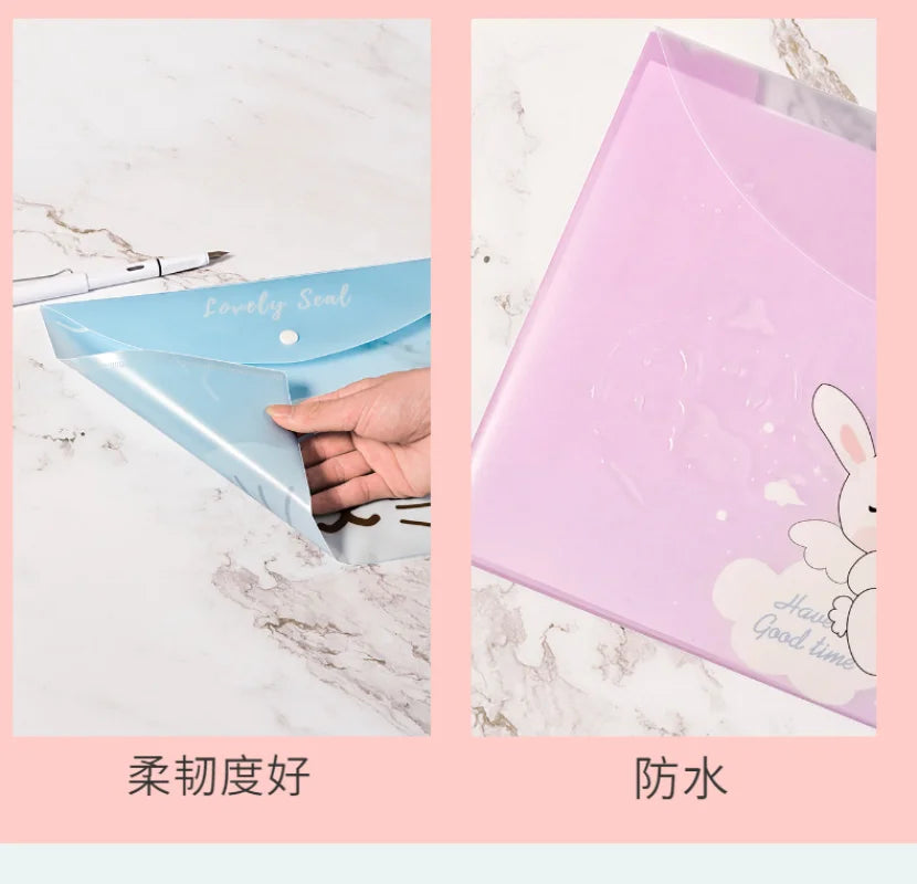 A pink transparent document pouch with a bunny design and a blue pouch, demonstrating waterproof features.