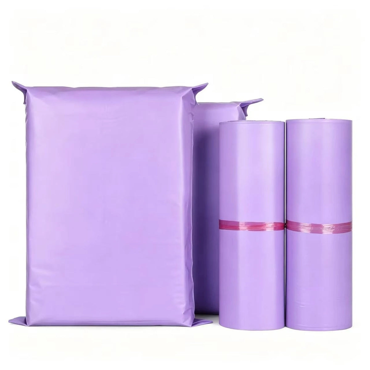 A stack of matte purple self-adhesive mailing bags, some rolled up.