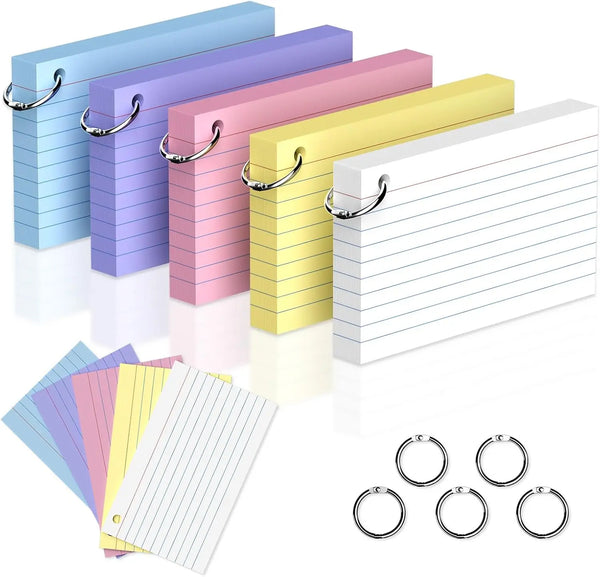 A set of five colored lined index cards with metal key rings displayed on a reflective surface.
