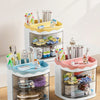 A set of white desktop pen holders with colorful accents and animal figures for office or school use.