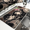 A gaming mouse pad featuring a stylized illustration of Andy and Leyley from The Coffin of Andy and Leyley