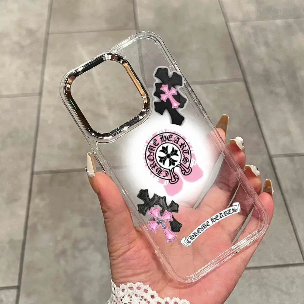 A clear holographic gradient phone case for an iPhone featuring a black and pink floral design.