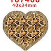 A heart-shaped acrylic hairbow featuring a leopard print design with gold glitter accents.