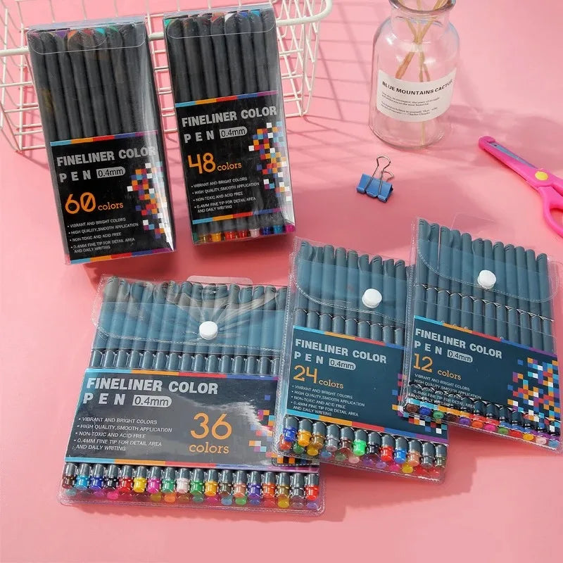 A collection of fine line marker pens in various colors and quantities displayed on a pink background.