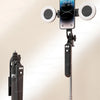 A wide-angle selfie stick tripod with a smartphone mounted, featuring two round lights for stable shooting.