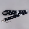Black patterned cartoon cat card holder lanyard with a neck strap