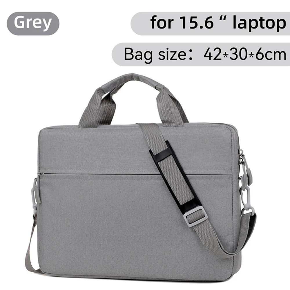 A grey laptop sleeve designed for 15.6 inch laptops, featuring padded protection and carrying straps.