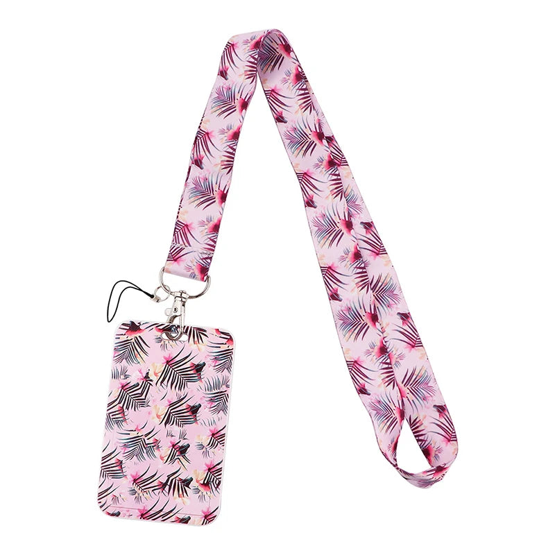 Pink floral patterned fabric lanyard with a silver clasp for ID badges and accessories