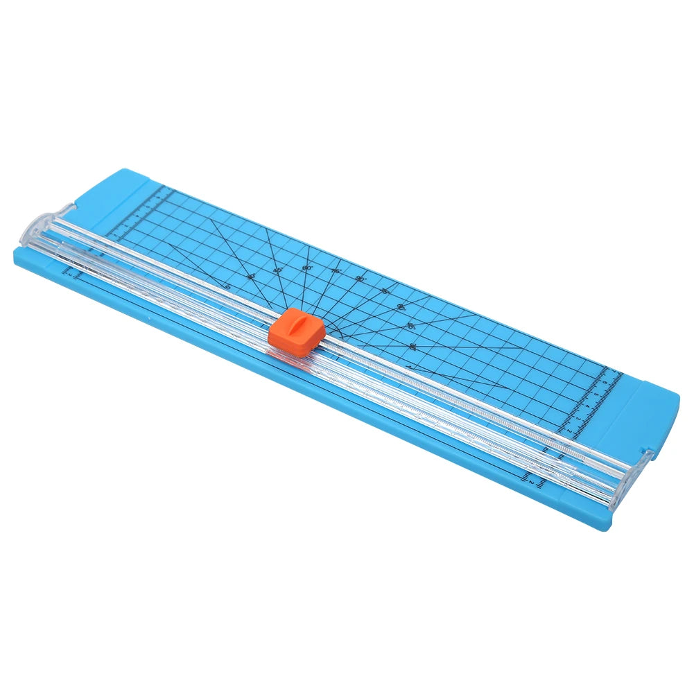 A portable manual paper trimmer with a blue body and an orange guide, showing a measurement grid.