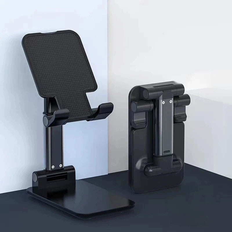 A black adjustable desktop phone stand designed to hold smartphones and tablets.