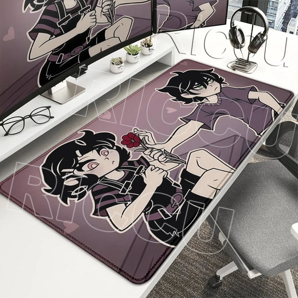A gaming mouse pad featuring an anime-style character design on a purple background.