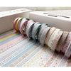 A collection of colorful retro washi tape rolls displayed on a white box.