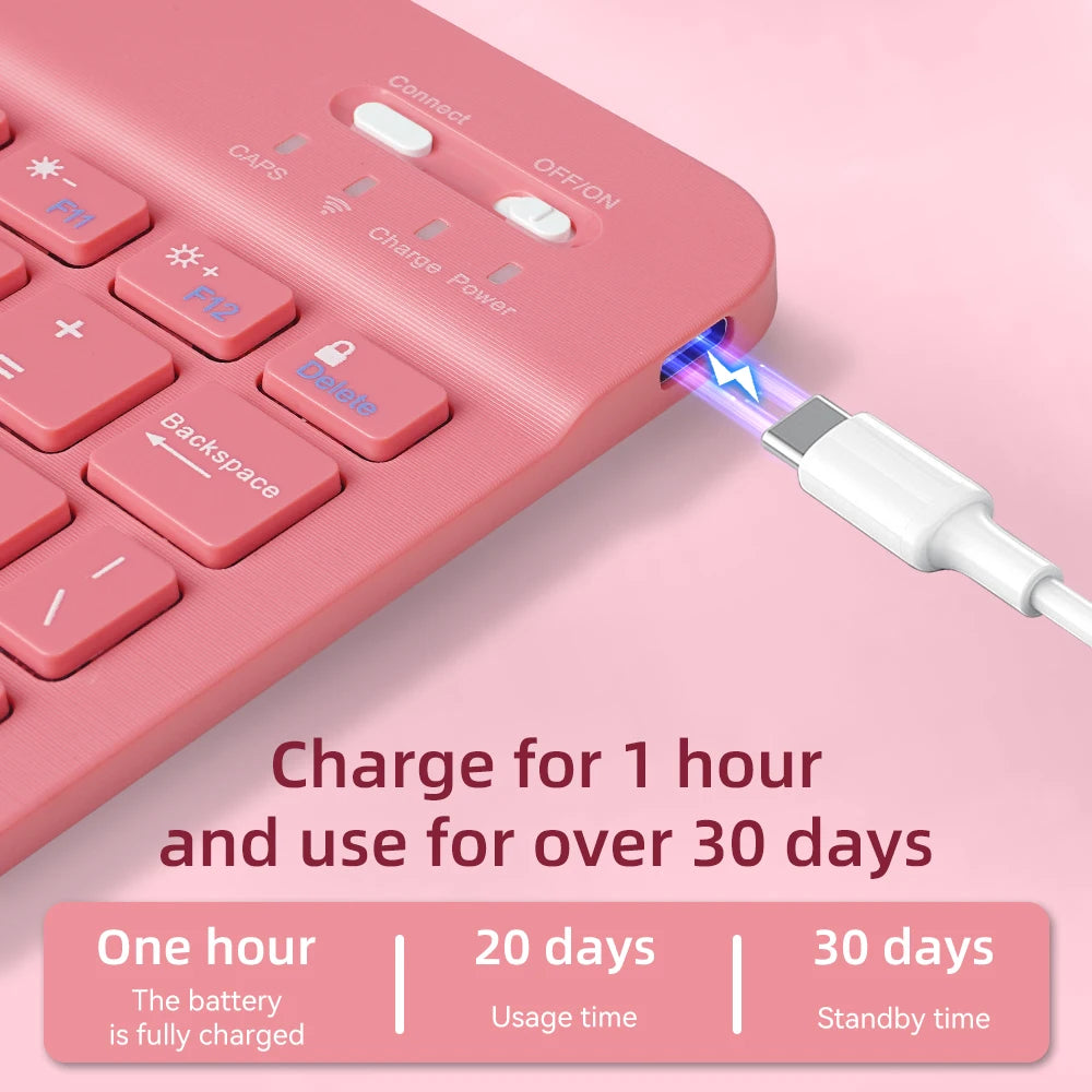A pink universal slim protective case with an integrated keyboard is shown charging via a connector.