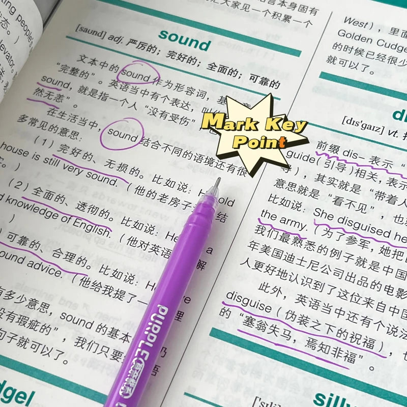 A close-up of a purple gel pen writing on a sheet of paper with English and Chinese text, featuring a Mark Key Point diagram.