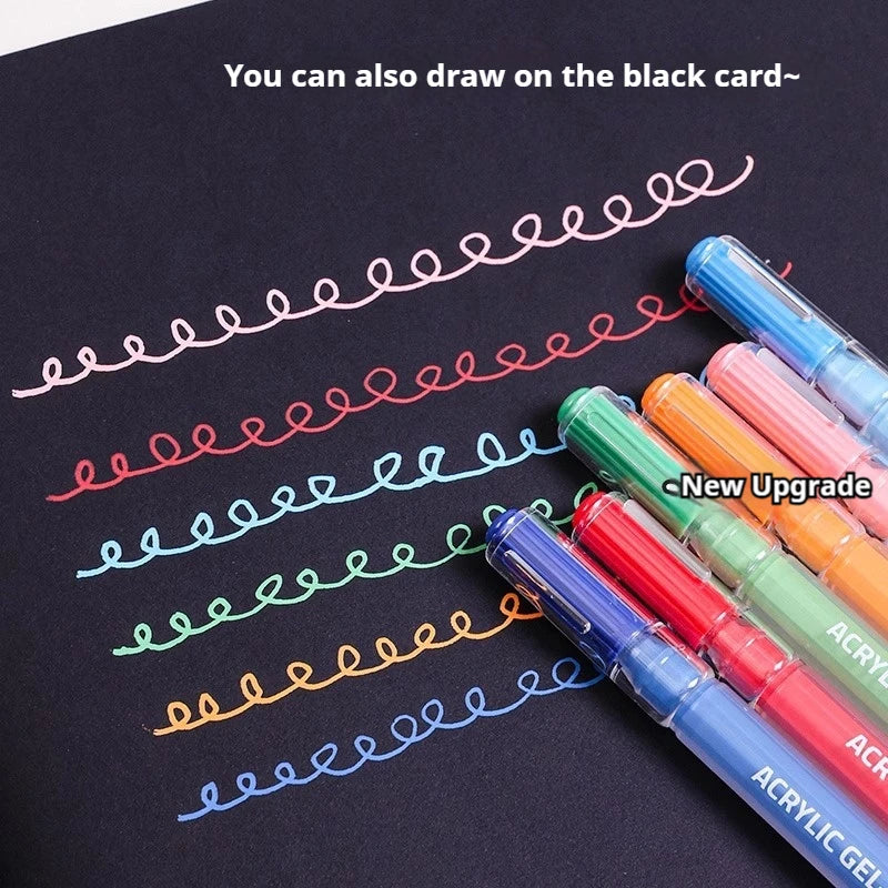 A set of multi-color acrylic painting gel pens is shown drawing wavy lines on a black card.