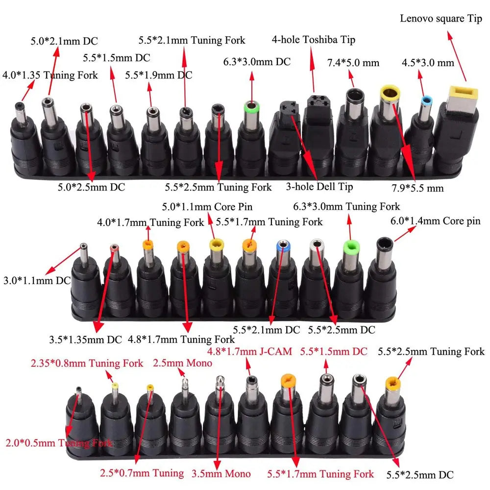 A collection of various laptop charger connector tips and tuning forks in black and gold colors.