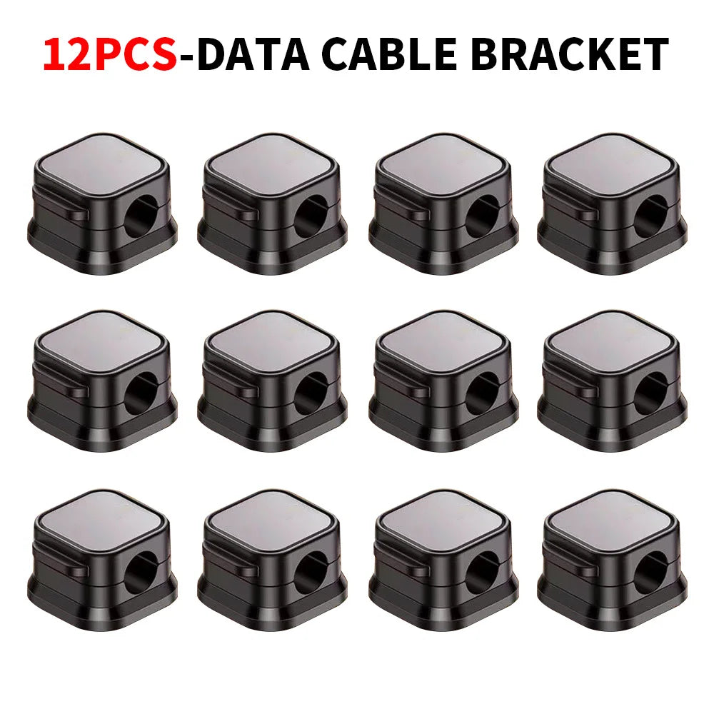 Twelve black plastic data cable brackets or clips arranged in a grid.