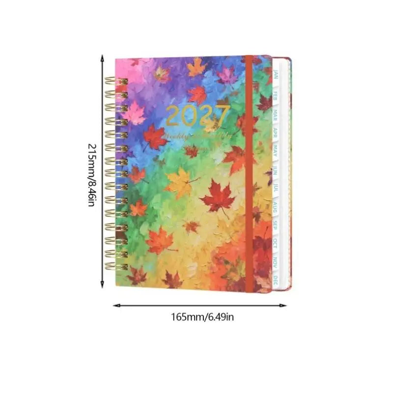 A5 spiral bound planner featuring a colorful autumn leaf design and monthly tabs.