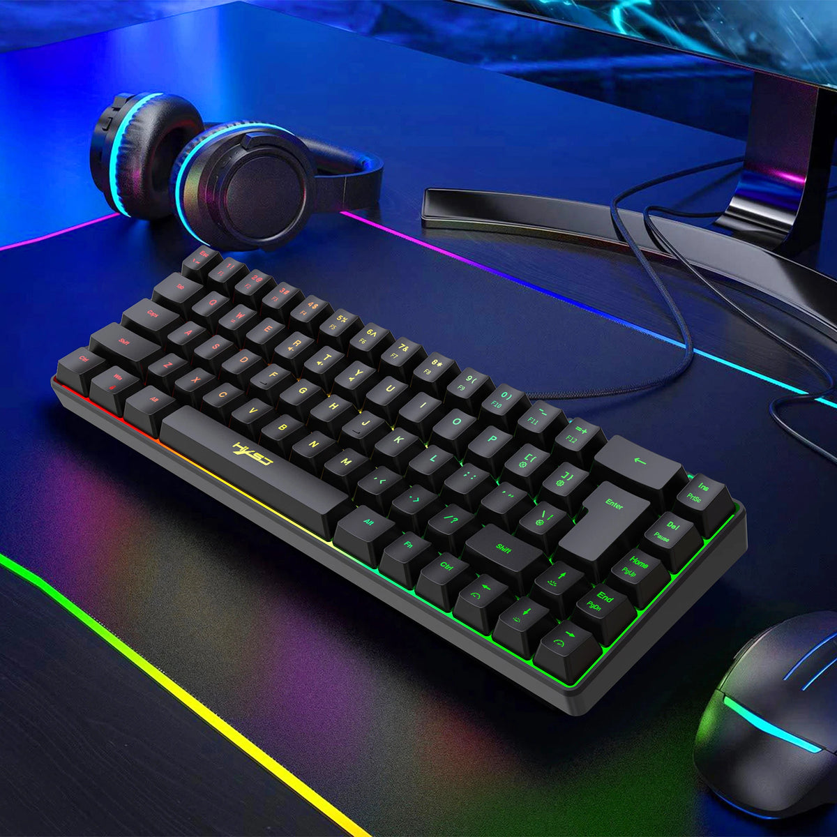 A black 68-key wired RGB gaming keyboard is displayed on a dark surface with headphones and a mouse nearby.