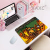 A gaming mouse pad featuring a cartoon dog sitting calmly in flames, designed for a computer mouse.