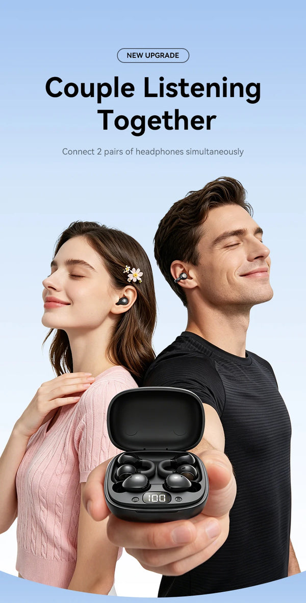 A couple listening to music together while holding a black wireless clip-on earbud charging case.