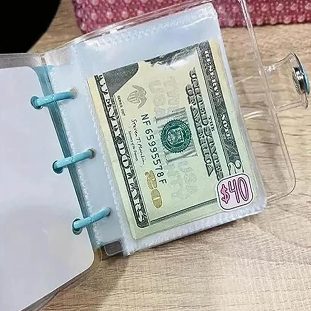 A clear plastic binder holds a US $40 bill and a white sheet of paper.