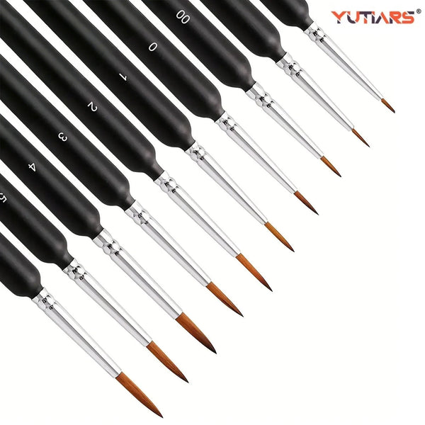 A set of professional miniature paint brushes with black handles and silver tips, arranged diagonally.