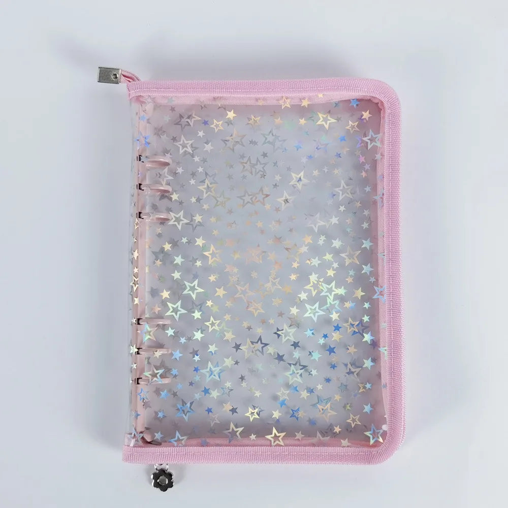 A pink A5 sticker organizer binder with clear storage pockets and a mesh cover.