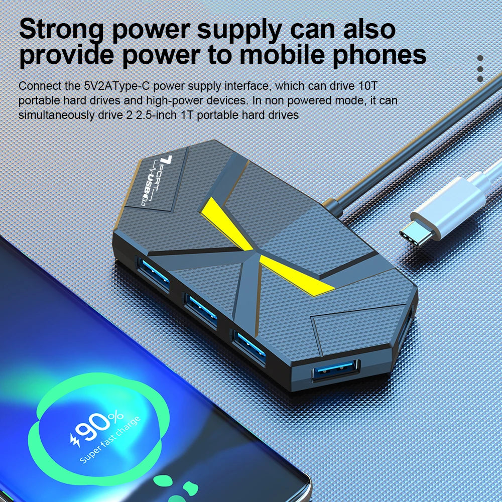 A black USB 3.0 multi-port hub with a Type-C power port is shown next to a smartphone.