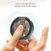 A hand is holding a fingerprint gyroscope device, demonstrating its use for relaxation and entertainment.