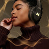 Headphones demonstrating the dual EQ mode feature, switching between Bass Mode and Vocal Mode.