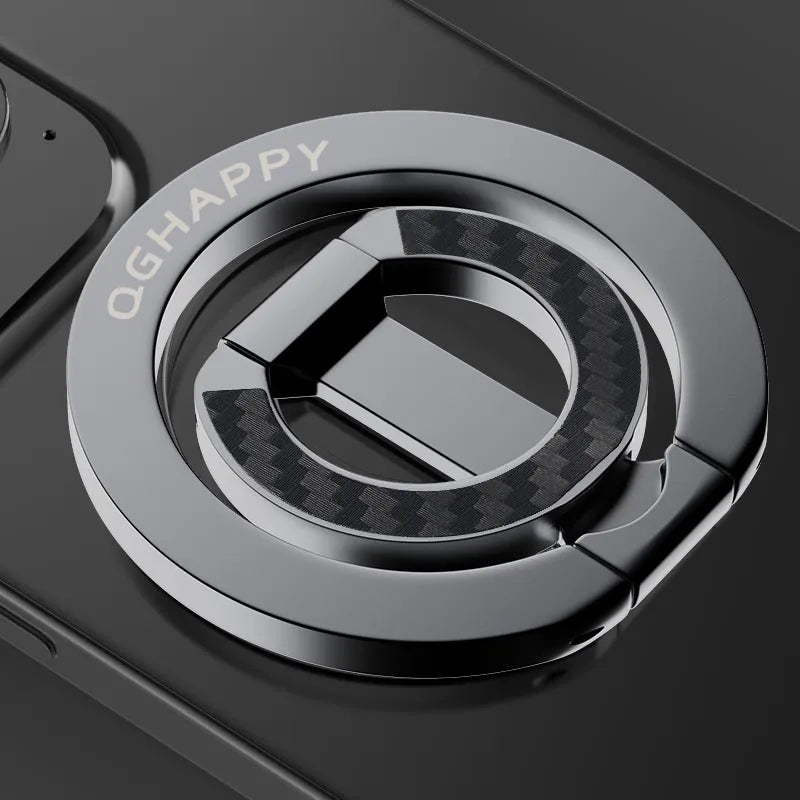 A close-up of a silver phone ring holder with the QHAPPY logo on a dark device.