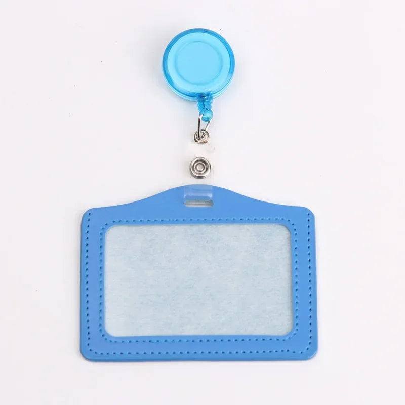 A light blue PU leather retractable ID card holder with a clear plastic window and a blue clip.