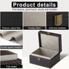 A black and gray RFID blocking Faraday key fob protector case with a gold-tone hardware and double layered shielding.