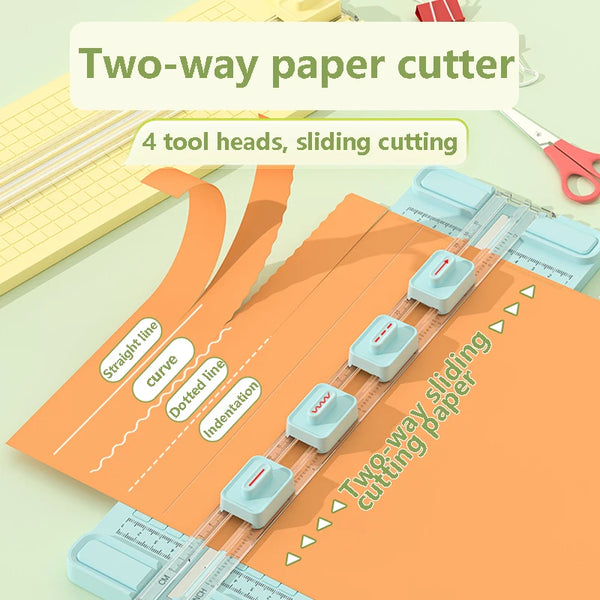 A two-way paper cutter tool with four sliding cutting heads demonstrating straight line, curve, dotted line, and indentation 