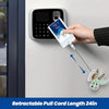 A hand is pulling a retractable cord from a badge reel mounted on a wall.