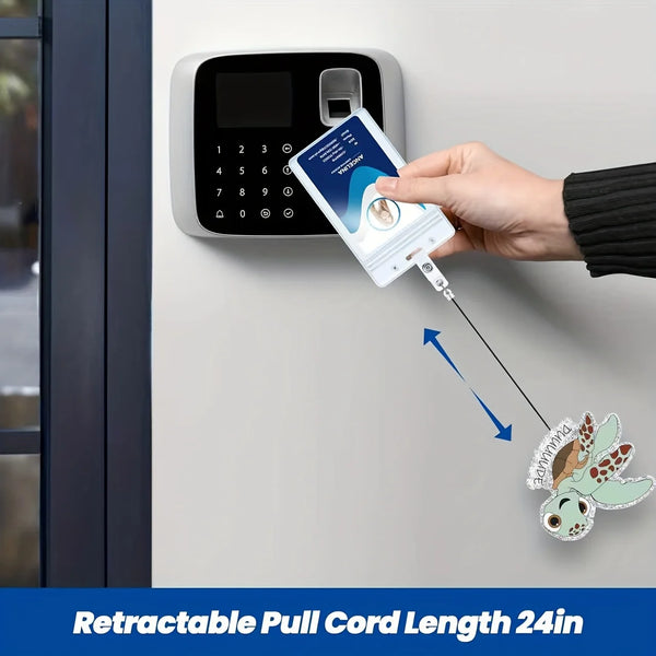 Eine Hand zieht ein ausziehbarer Kabel von einem Badge-Reel, das an der Wand montiert ist.