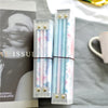 Clear PVC cover for a standard travelers notebook with multiple colored pens inside.