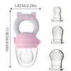 A silicone fruit and vegetable feeder set for babies and toddlers, featuring a pink and gray feeding apparatus.