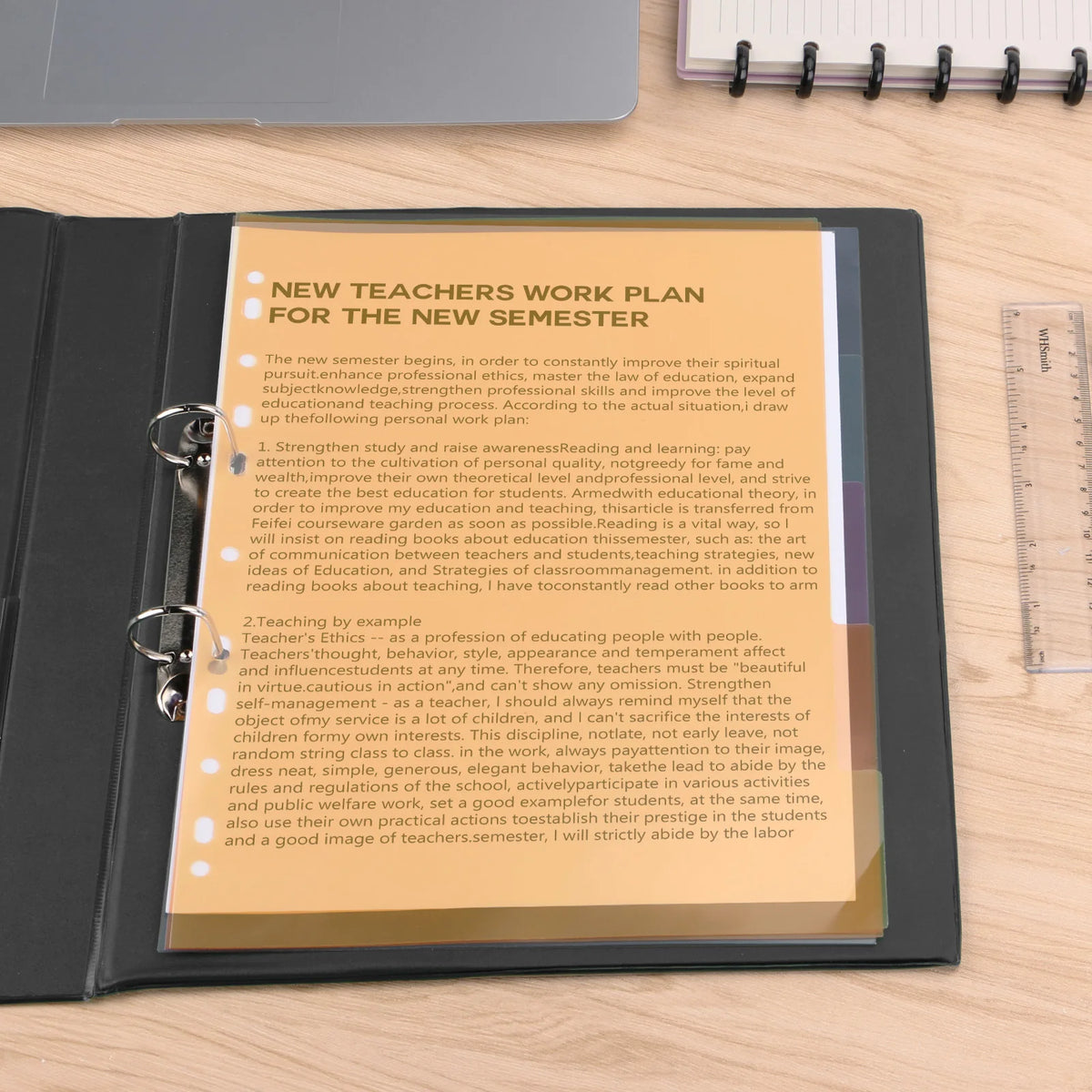 A set of yellow A4 index dividers with tabs for organizing binders and notebooks.