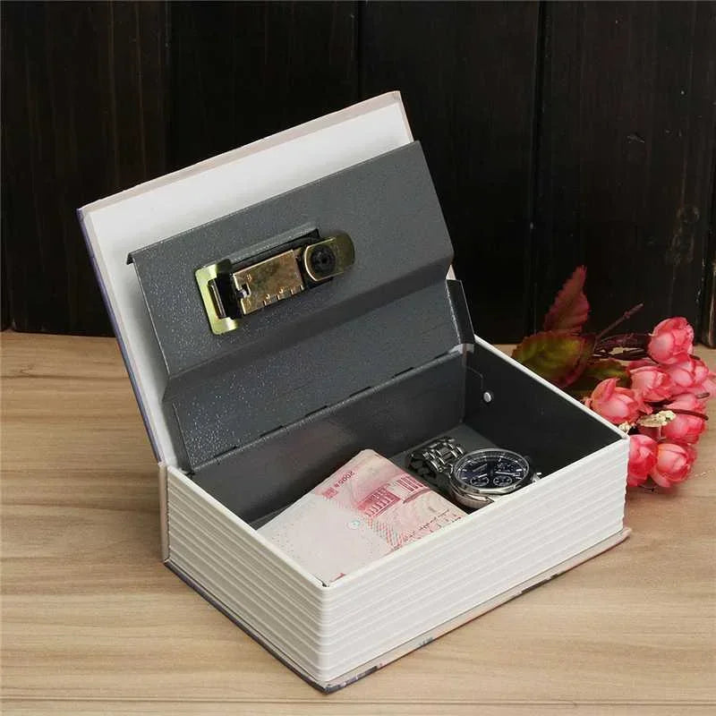 A small, open box-style safe or diary is shown with a lid open, revealing a compartment for keys and valuables.