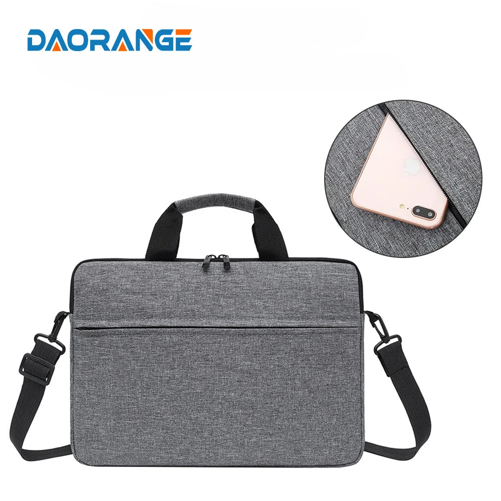 A gray laptop and tablet messenger bag with a padded sleeve and adjustable strap.