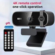 A black 4K remote control webcam with an HD privacy cover and microphone, shown on a white surface.