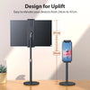 A black adjustable desktop monitor stand designed to elevate devices from 24cm to 47cm.