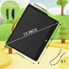 A black 13 inch interactive LCD writing tablet is shown with pens and a charging cable in a bright outdoor setting.