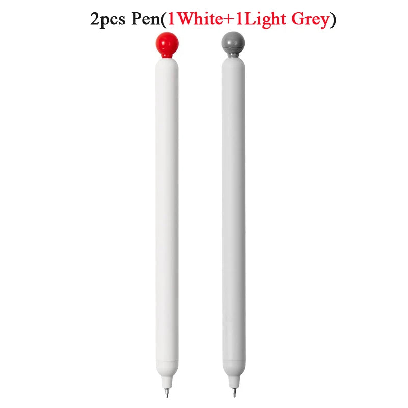 Two pens are shown, one white and one light grey, with red tips.