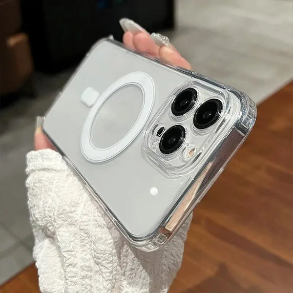 A hand holds a clear magnetic phone case with built-in magnets, showcasing the design and compatibility.